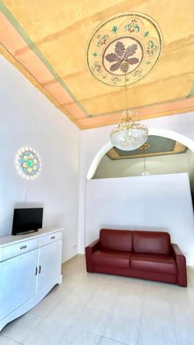 TV a/nebo společenská místnost v ubytování b&b dimora regina margherita