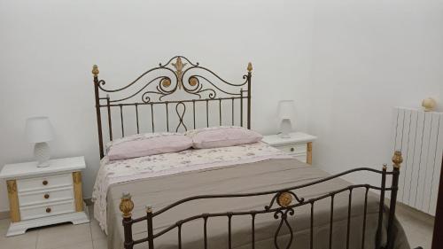 Postel nebo postele na pokoji v ubytování b&b dimora regina margherita