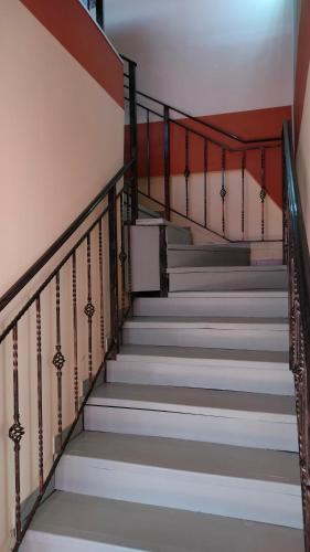 a set of stairs in a building at Casa Emil in Floreşti