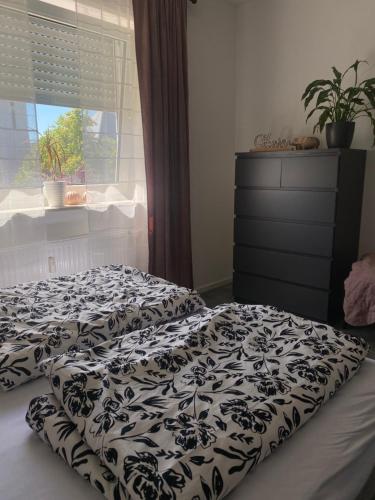 Postel nebo postele na pokoji v ubytování HomeSweetHome#Speyer