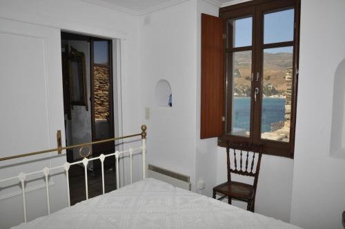 Ένα ή περισσότερα κρεβάτια σε δωμάτιο στο Traditional Ηouse - Endless Aegean Sea View