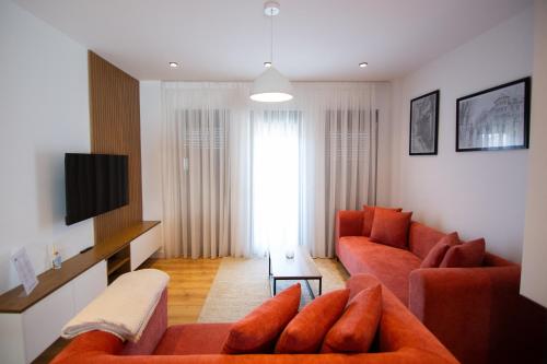Μια τηλεόραση ή/και κέντρο ψυχαγωγίας στο MOHO Residences Downtown Korca-Republika Boulevard