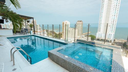 a swimming pool on the roof of a building at Hotel Zi One Luxury in Cartagena de Indias
