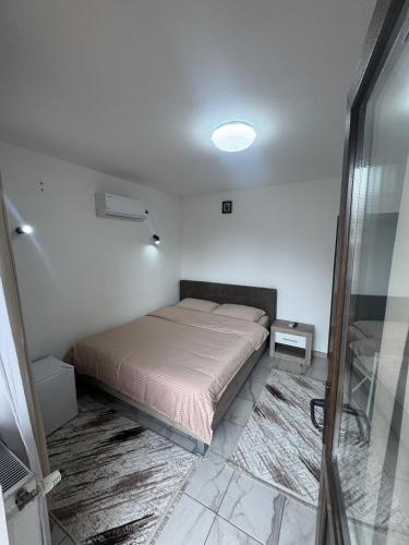 Postel nebo postele na pokoji v ubytování Rustic House