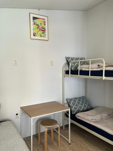 Postel nebo postele na pokoji v ubytování Inside Busan Hostel