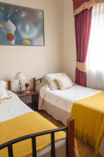Hotel Empresarialにあるベッド