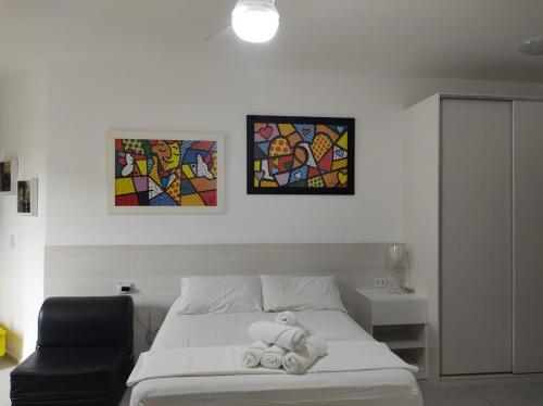 Ένα ή περισσότερα κρεβάτια σε δωμάτιο στο LOFT SAHY MANGARATIBA