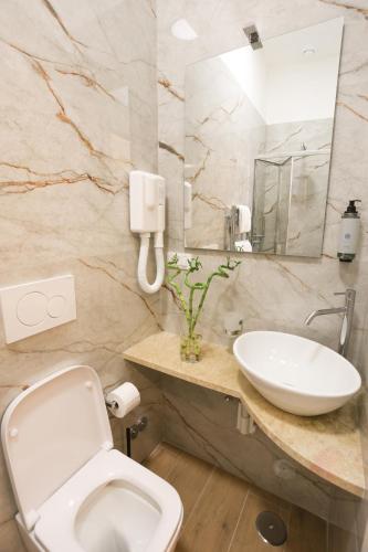 Koupelna v ubytování B&B Smart Rooms