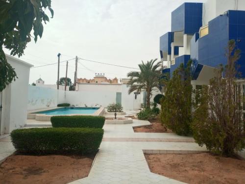 Piscina a Résidence ASMAA o a prop