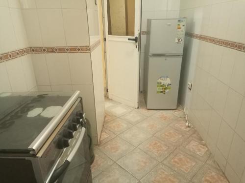 Η κουζίνα ή μικρή κουζίνα στο Résidence ASMAA