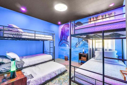 two bunk beds in a room with a mural at Avatar Miami Villa - Heated Pool & Spa - Pickleball & Cinema in Hammocks