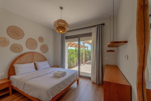 Postel nebo postele na pokoji v ubytování Charming Jungle Home