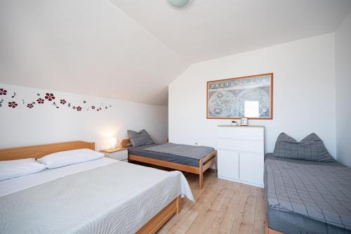 Posteľ alebo postele v izbe v ubytovaní Apartment Vrsi - Mulo 3276a