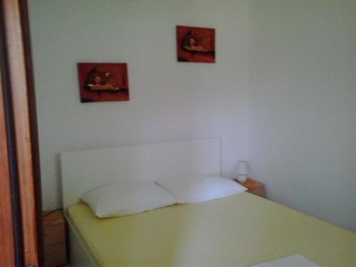 Postel nebo postele na pokoji v ubytování Apartment Novi Vinodolski 15292b