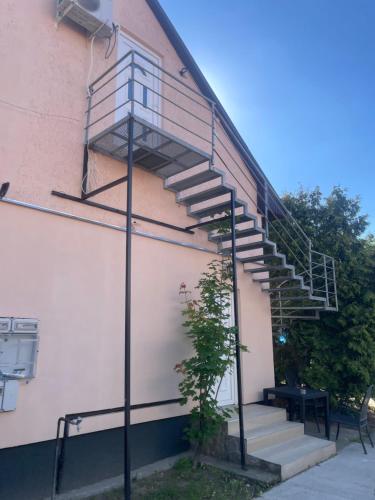 a spiral staircase on the side of a building at Aphrodite in Debrecen