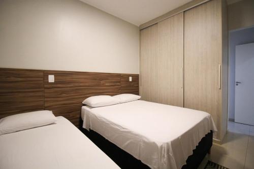 Ένα ή περισσότερα κρεβάτια σε δωμάτιο στο Apartamento em Olimpia - SP