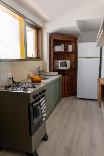 Dapur atau dapur kecil di Apartamentos Alborada