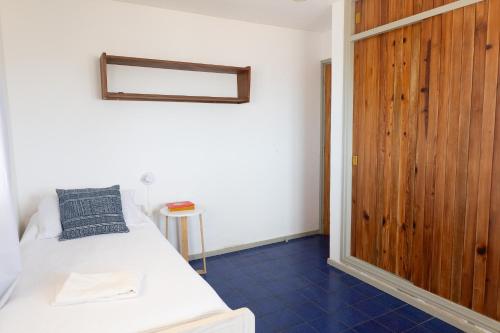 Katil atau katil-katil dalam bilik di Apartamentos Alborada