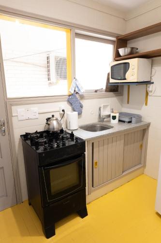 Dapur atau dapur kecil di Apartamentos Alborada