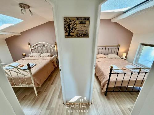 Postel nebo postele na pokoji v ubytování Maison climatisée 8 personnes - 3 chambres - calme et détente