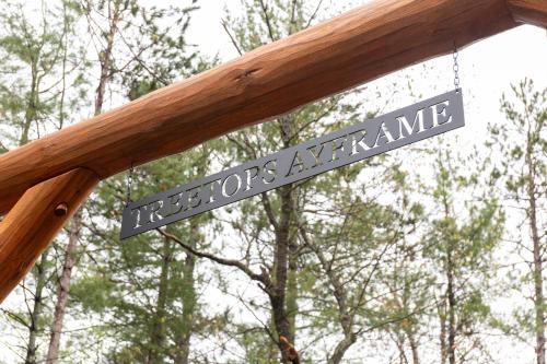 Sijil, anugerah, tanda atau dokumen lain yang dipamerkan di TreeTops Ayframe, Supersized AFrame on the River with Hot Tub