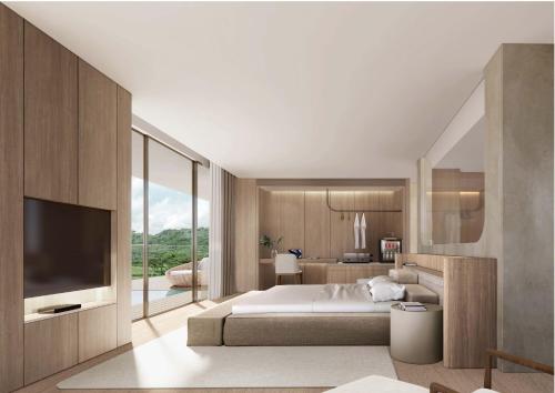 a bedroom with a large bed and a television at Viewpoint Khaoyai Hotel in Mu Si