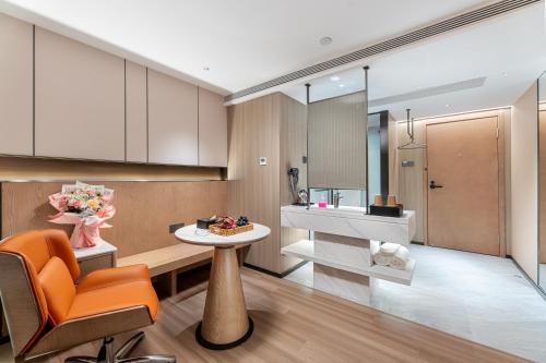 Posezení v ubytování Guangzhou JinTang Hotel