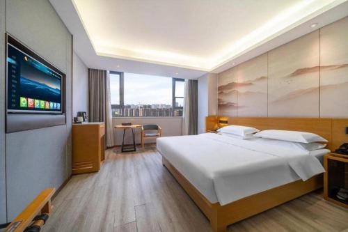 Katil atau katil-katil dalam bilik di Jinjiang Metropolo Zhengzhou Songshan Road