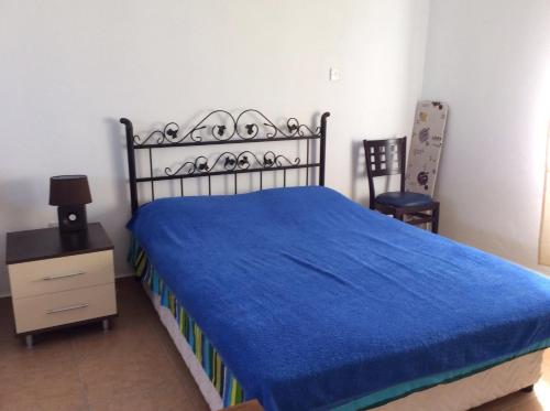 Una cama o camas en una habitación de Olive Garden