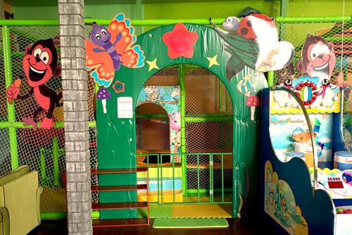 a room with a door with cartoon characters on it at Grandsons Hostel in Mekhrably