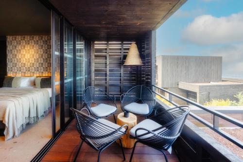 Postel nebo postele na pokoji v ubytování Wood Hôtel & Spa