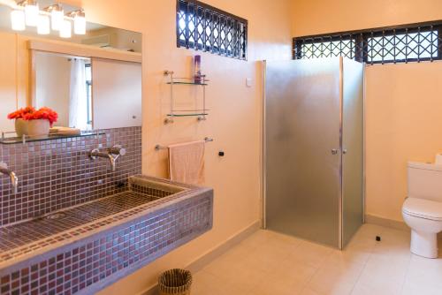 Vonios kambarys apgyvendinimo įstaigoje Villasun Beachfront Villa