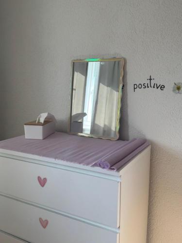 เตียงในห้องที่ Fribourg Home Junior