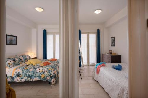 Posteľ alebo postele v izbe v ubytovaní Casa Trinacria Taormina