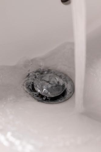 a close up of a metal object in a sink at Villa ENTO HotelWestEnd in Frankfurt/Main