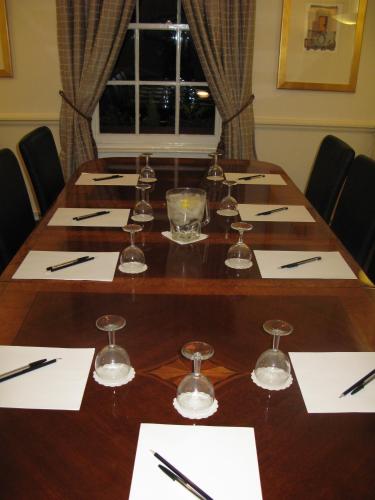 a table with wine glasses and napkins on top at The Park Hotel - Sure Hotel Collection by Best Western in Diss