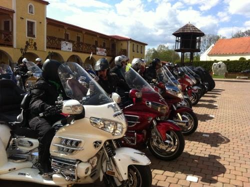 a group of motorcycles parked in a row at Hotel Resort Stein in Cheb