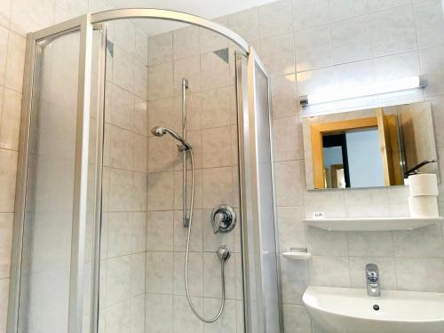 a bathroom with a shower and a sink at Apartment in Fügen near Ski Lift in Fügen