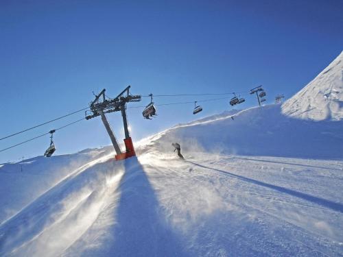 a person skiing down a snow covered ski lift at Apartment in Fügen near Ski Lift in Fügen