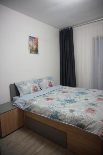 Ένα ή περισσότερα κρεβάτια σε δωμάτιο στο Apartament Georgiana