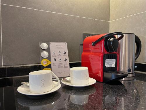 Příslušenství pro přípravu čaje a kávy v ubytování Citadines Gaoxin Chengdu