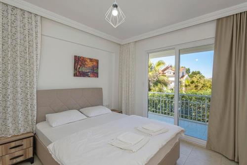 Ένα ή περισσότερα κρεβάτια σε δωμάτιο στο Villa Ekiz, Fethiye