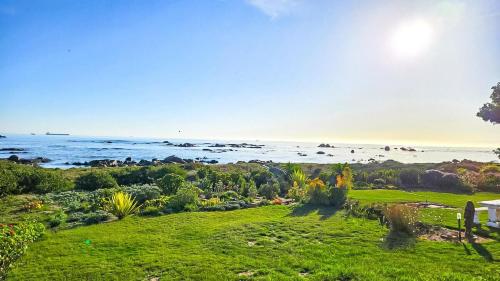 a view of the ocean from a house at Amore in West Point