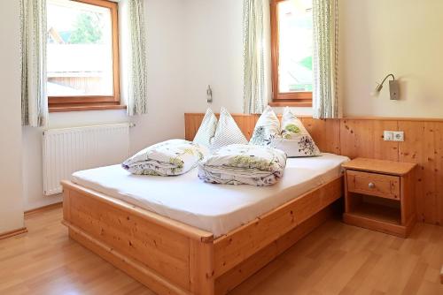 Postel nebo postele na pokoji v ubytování Obermüllerhof