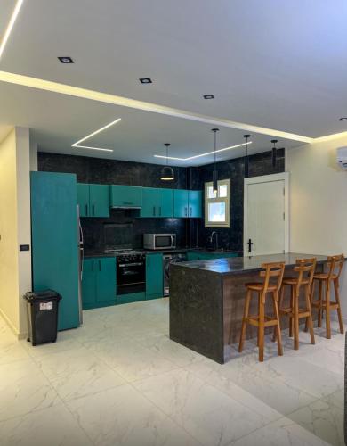 Кухня или мини-кухня в Hacienda Bay
