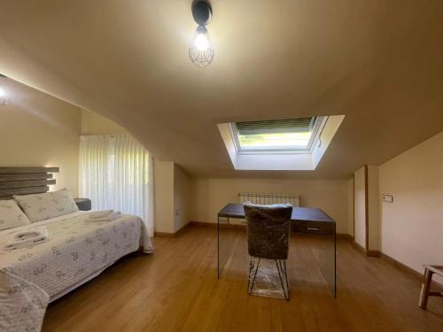 Ένα ή περισσότερα κρεβάτια σε δωμάτιο στο Casa Trasgu para 6 personas en Infiesto