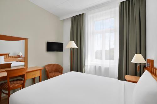 Danubius Hotel Rabaにあるベッド