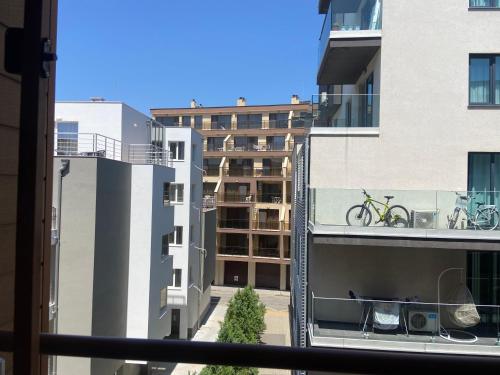 a bike on the balcony of a building at Apartments Pomorie Tundzha 9 in Pomorie