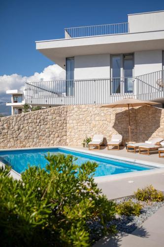 Poolside architect quadruplex