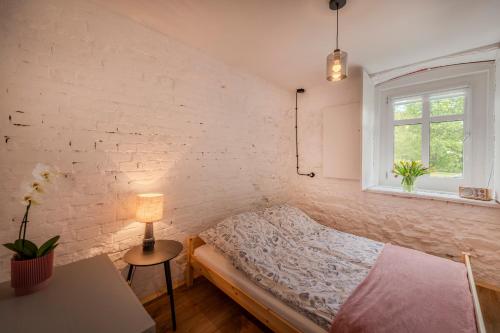 Giường trong phòng chung tại Apartamenty Śnieżna 12 Lądek- Zdrój